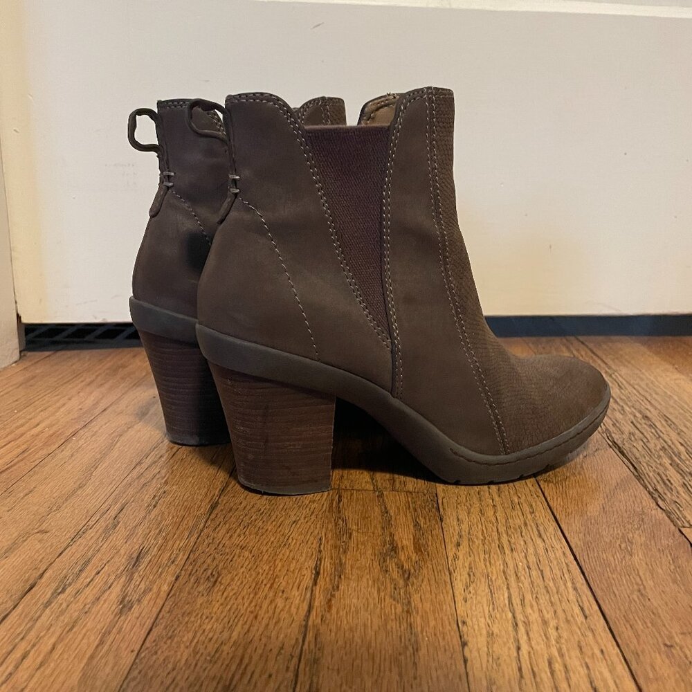Light brown medium heel booties brand Baretraps Posture